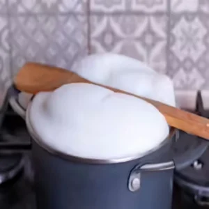 kitchen hack wooden spoon milk test